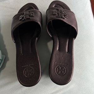 Worn once for a few minutes. Like new condition. Black leather.